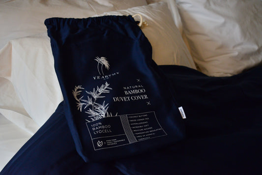 Deep Ocean Blue 100% Bamboo Lyocell Duvet Cover on cozy bed