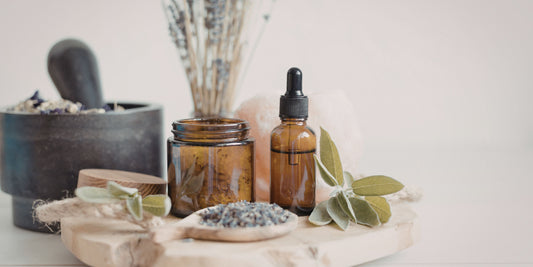 Lavender, essential oils and holistic living essentials sit on a table at Vearthy.com 