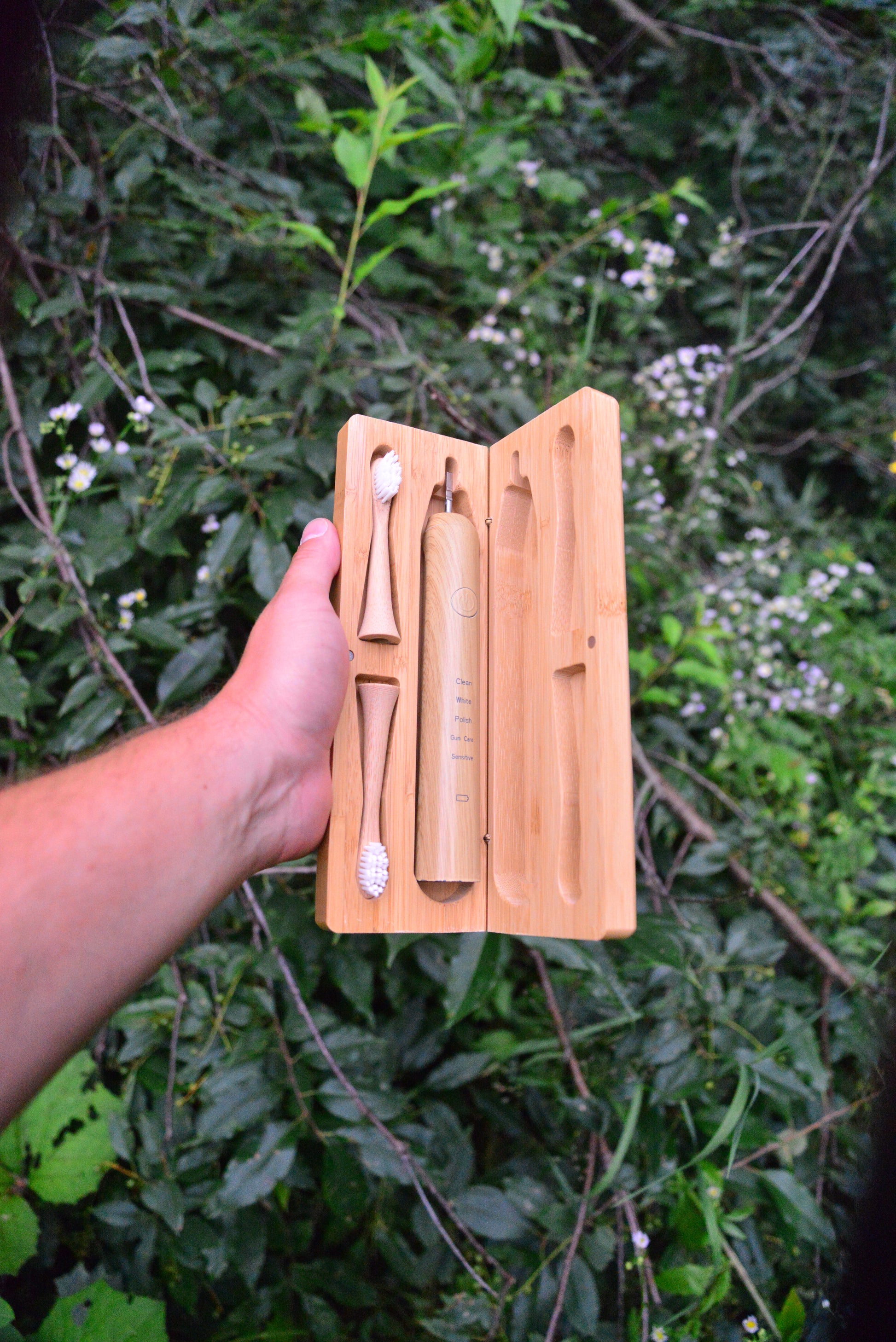 Travel case for bamboo toothbrush in the forest 