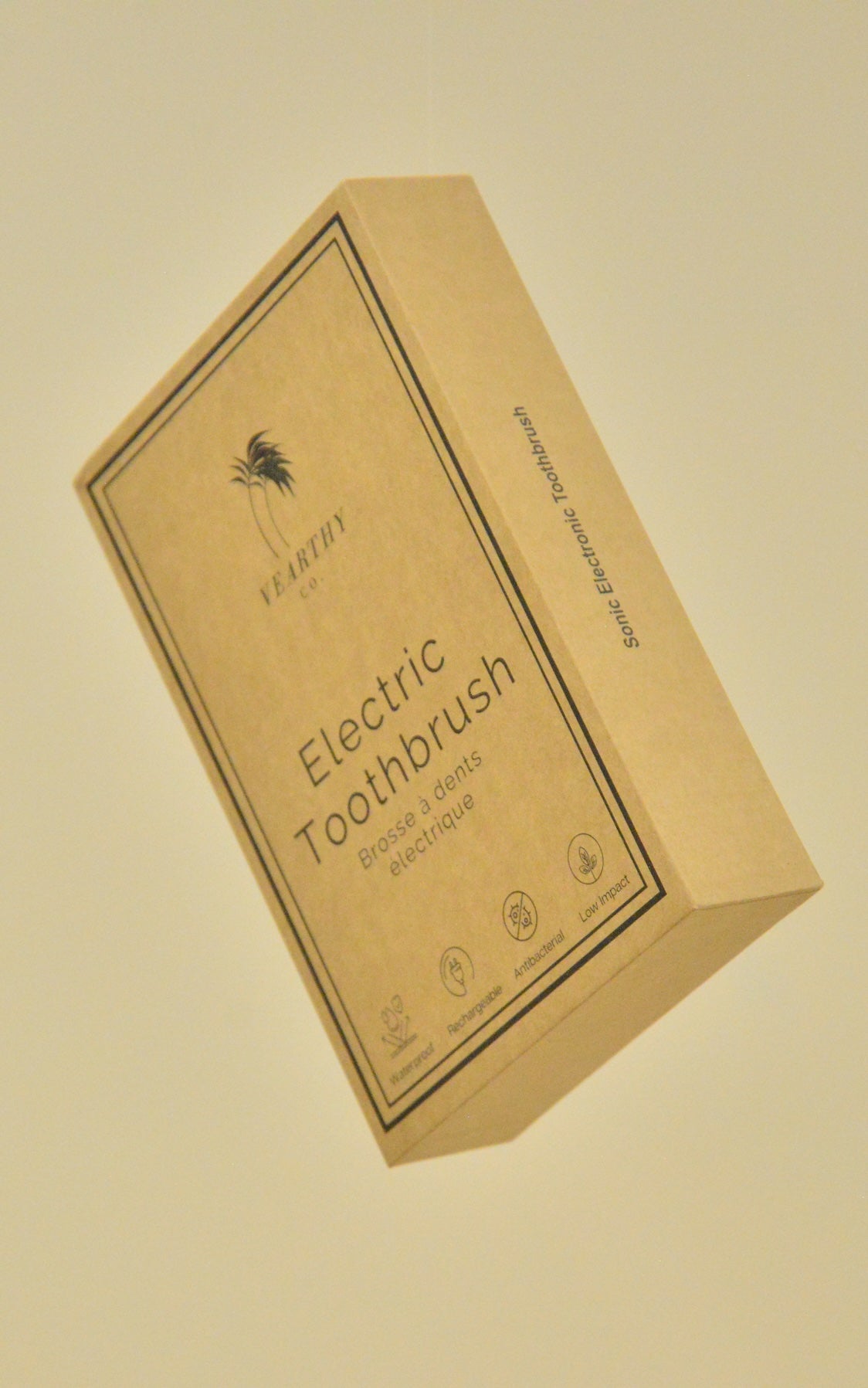 Vearthy Cardboard box packaging for electric toothbrushes on a beige background